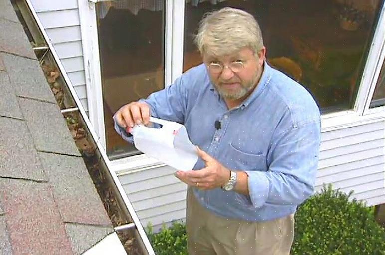 Innebærer å bruke en plastbøtte med et metallhåndtak